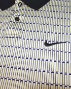 Close-up of a patterned shirt with a Nike logo